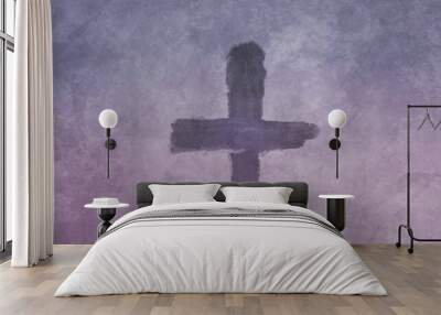 Cross made from ashes. Symbolic of Ash Wednesday. On vintage purple, gray background. Wall mural