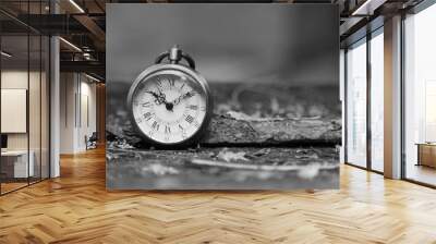 Old watch on wood table Wall mural