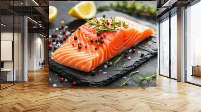 fresh salmon fillet with herbs lemon and peppercorns on slate plate gourmet seafood dish food photography Wall mural