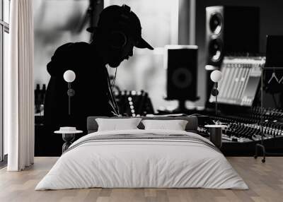 music producer working in recording studio creating electronic beats black and white silhouette Wall mural