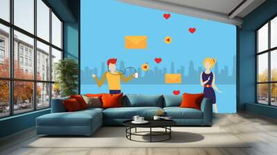 young couple using device with social media app Wall mural