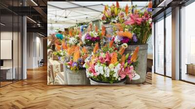 Bouquets of fresh cut flowers on display at a farmers market in Boulder, Colorado Wall mural