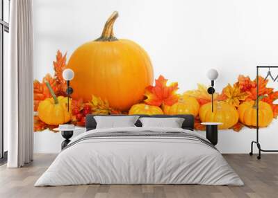 Autumn arrangement of pumpkins with red leaves Wall mural