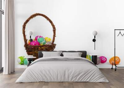 Easter basket with long border of colorful hand painted Easter Eggs over a white background Wall mural