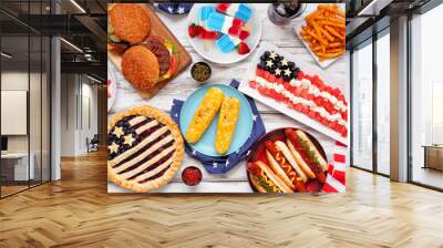 Fourth of July, patriotic, American themed food. Above view table scene on a white wood background. Wall mural