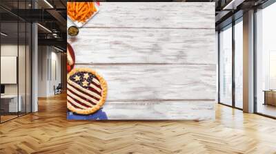 Fourth of July, patriotic, American themed food. Top view side border on a white wood banner background. Copy space. Wall mural