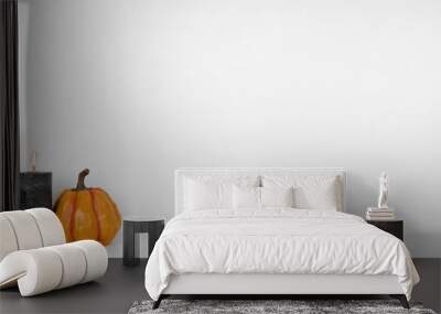 Halloween shelf display with pumpkins, black candles and spiders against a white wall with bats. White shelf. Banner with copy space. Wall mural