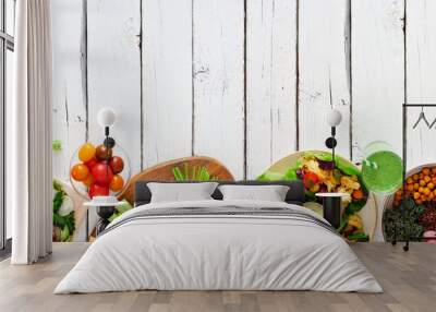 Healthy lunch food bottom border. Table scene with nutritious buddha bowl, lettuce wraps, sandwiches, salad and vegetables. Top view over a white wood background. Copy space. Wall mural