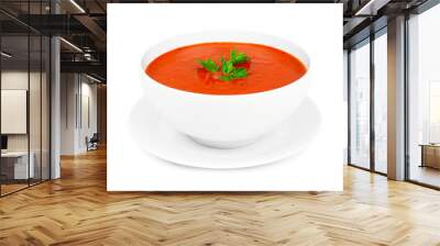 Homemade tomato soup in a white bowl with saucer. Side view isolated on a white background. Wall mural