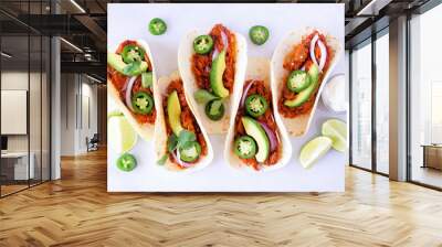 Jack fruit vegan tacos. Above view over a white marble background. Healthy eating, plant-based pulled pork meat substitute. Wall mural