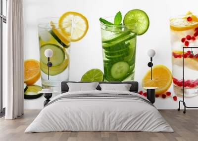 Three types of detox water with fruit in glasses isolated on a white background Wall mural