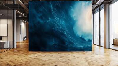 Powerful ocean wave crashing vividly against dark blue water. Wall mural