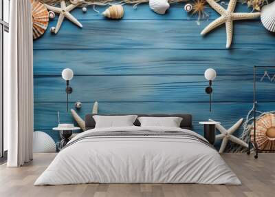 Seashell and starfish arrangement on blue wooden background, perfect for summer-themed projects, vacation visuals, or beach party invitations. Wall mural