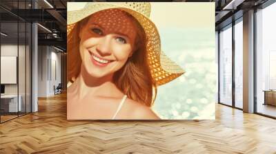 beauty happy woman in hat enjoy sea at sunset on beach Wall mural