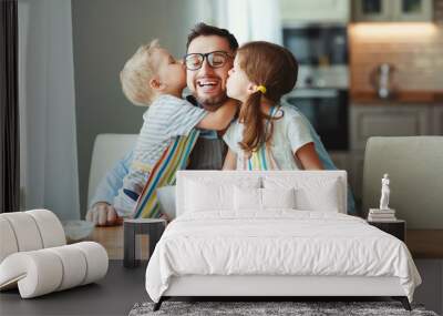 father with children   baking cookies Wall mural