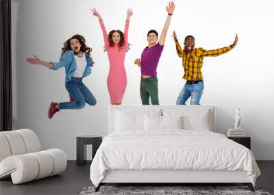 group of cheerful young people men and women isolated on white background. Wall mural