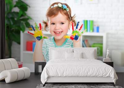 hands in colored paint  happy child girl Wall mural