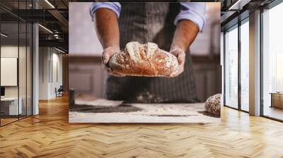 hands of baker's male knead dough Wall mural