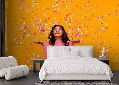 happy birthday! cheerful funny ethnic  woman with festive confetti on yellow Wall mural