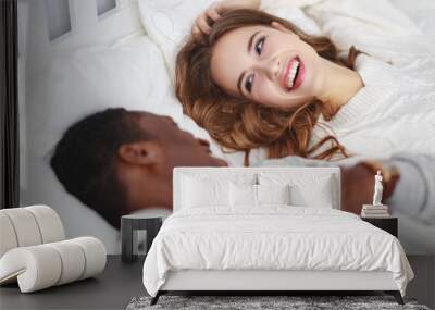 happy couple in love on winter morning in bed Wall mural