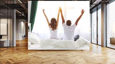 happy couple in love on winter morning in bed Wall mural