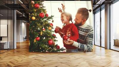 happy family father and child girl decorated Christmas tree Wall mural