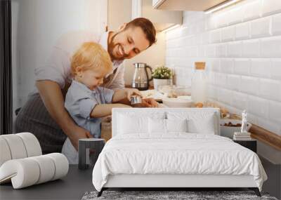 happy family in kitchen. father and child baking cookies Wall mural