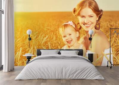 happy family in summer nature. Mother and baby daughter in the w Wall mural