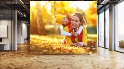 happy family mother and child daughter on   autumn walk Wall mural