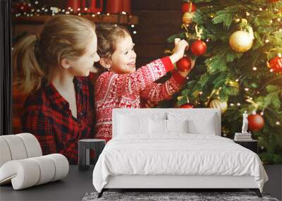 happy family mother and child girl decorated Christmas tree Wall mural