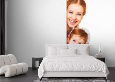 happy family mother child daughter with blank white poster Wall mural