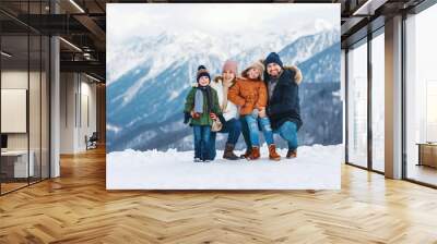 happy family mother father and children on winter nature  . Wall mural