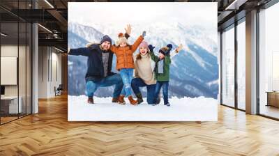 happy family mother father and children on winter nature  . Wall mural