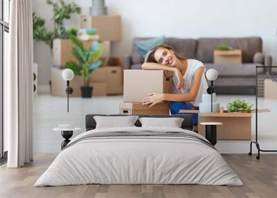 happy   girl with boxes moves to new apartment Wall mural