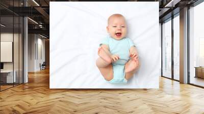 happy newborn baby on bed Wall mural