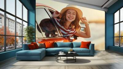 happy woman girl goes to summer travel trip in   car. Wall mural