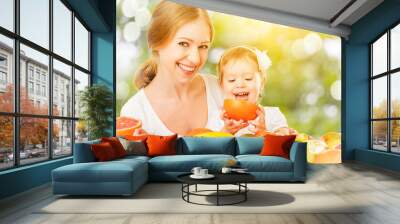 healthy vegetarian food. happy family mother and baby daughter w Wall mural