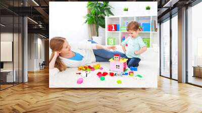 Mother and child daughter playing, build from constructor Wall mural