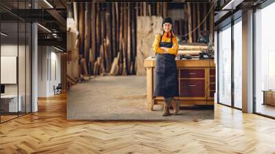 Positive woman working in joinery workshop Wall mural