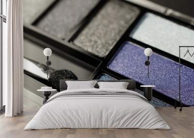 Closeup of Shimmery Eyeshadow Applicator and Palette in Cool Shades of Blue and Gray Wall mural