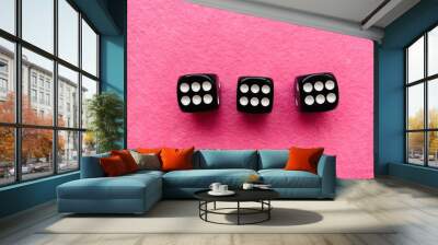 Black dice on pink background 666 Wall mural