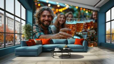 Group of multi ethnic friends having backyard dinner party together - Diverse young people sitting at bar table toasting beer glasses in brewery pub garden Wall mural