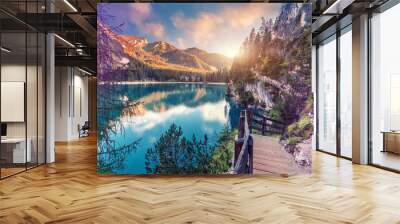 Wonderful sunrise view of Braies lake. Dramatic Unusual Scene. Colorful Sky over lago di Braies in Dolomites Alps. Awesome Alpine Highlands during sunset. Amazing nature Landscape at Summer Day Wall mural