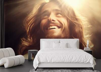 Portrait of a young man Jesus christ with long hair in the sunlight. Wall mural