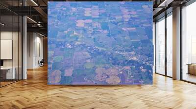 Aerial view of crop circles and squares over midwest states on flight over Colorado, Kansas, Missouri, Illinois, Indiana, Ohio and West Virginia during autumn. Grand sweeping views of agriculture land Wall mural