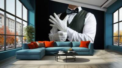 Portrait of Butler or Concierge Pulling on White Gloves in a Heroic Manner. Concept of Service Industry and Professional Hospitality. Wall mural