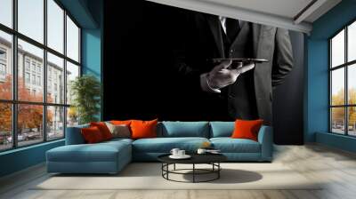 Portrait of Formal Butler or Waiter in Dark Suit and White Gloves Holding Silver Serving Tray. Professional Hospitality and Courtesy. Wall mural