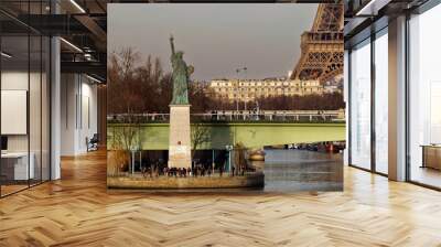 Paris, France - February 16, 2019: Liberty statue and Eiffel Tower near river seine in Paris Wall mural