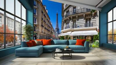 Paris, France - May 27, 2021: Eiffel tower between haussman buildings in Paris Wall mural