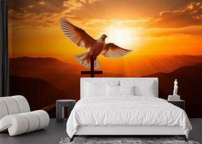 Peaceful dove flying with sunset or sunrise sky, embodying the Spirit of God. Wall mural